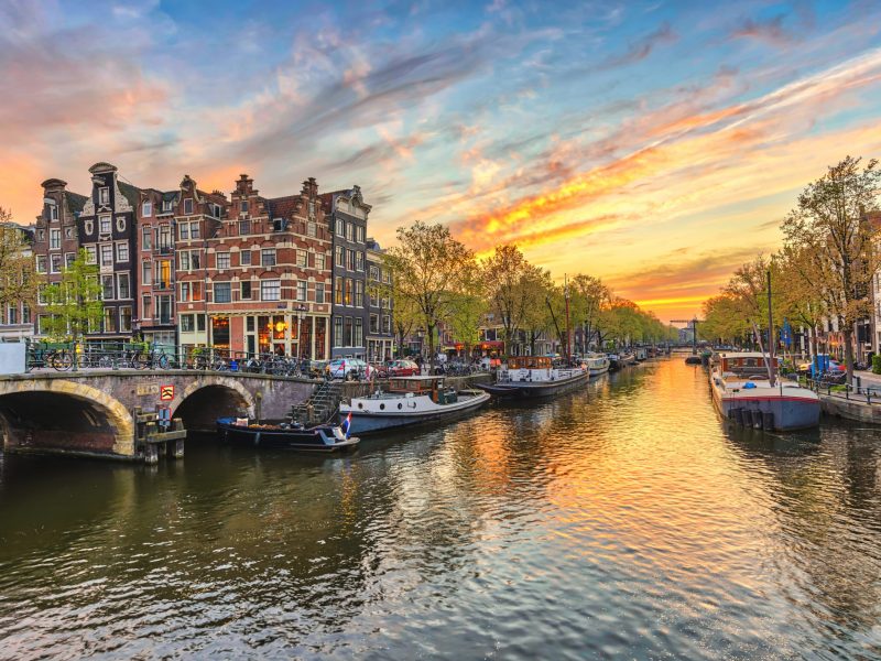 Amsterdam Sunset City Skyline At Canal Waterfront, Amsterdam, Netherlands